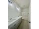 Bright bathroom with a double vanity, contemporary lighting, and separate shower and toilet area at 3258 Yorkshire Cir, Sanford, NC 27332