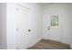 Bright entryway featuring beautiful floors, closet and a white door with glass pane at 3258 Yorkshire Cir, Sanford, NC 27332