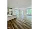 Spacious living area with large windows offering natural light and views of the outdoor scenery at 3258 Yorkshire Cir, Sanford, NC 27332
