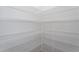 Large, walk-in pantry with metal shelving providing ample storage space for food and supplies at 3258 Yorkshire Cir, Sanford, NC 27332