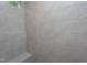 Tasteful tile shower with convenient built-in seat and shower head at 3258 Yorkshire Cir, Sanford, NC 27332