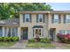 Charming townhome with neutral siding, bay window, and a well-manicured front yard at 35 Stonewall Way, Durham, NC 27704