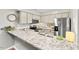 Bright kitchen featuring granite countertops, a breakfast bar, and stainless steel appliances at 35 Stonewall Way, Durham, NC 27704