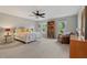 Spacious main bedroom with a ceiling fan and ample natural light at 35 Stonewall Way, Durham, NC 27704
