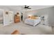Spacious main bedroom featuring neutral walls, ceiling fan and ensuite bathroom at 35 Stonewall Way, Durham, NC 27704