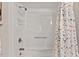 Bright white shower and curtain rod offering style, utility and privacy at 35 Stonewall Way, Durham, NC 27704