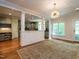 Open-concept kitchen with modern appliances and seamless flow to living areas at 3504 Rock Creek Dr, Raleigh, NC 27609