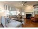 Bright living room with hardwood floors, fireplace, and modern decor at 3504 Rock Creek Dr, Raleigh, NC 27609