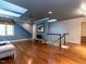 Large living room with skylights and hardwood floors at 3504 Rock Creek Dr, Raleigh, NC 27609