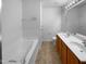 Bathroom featuring double sink vanity, tub and shower combo at 351 Gilman Ln # 109, Raleigh, NC 27610