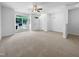 Large, bright living room with large window view of front yard at 351 Gilman Ln # 109, Raleigh, NC 27610