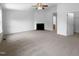 Bright living room with fireplace and ceiling fan at 351 Gilman Ln # 109, Raleigh, NC 27610