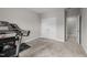 Exercise room featuring a treadmill and storage for workout equipment and accessories at 403 Prestwood Dr, Hillsborough, NC 27278