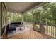 Inviting screened porch with comfortable seating, perfect for enjoying the outdoors at 403 Prestwood Dr, Hillsborough, NC 27278