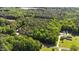 A picturesque aerial view showcasing the vast greenery surrounding a home, highlighting its secluded location at 407 Howard Tant Rd, Zebulon, NC 27597