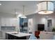 Open kitchen with views into the living room and stairway at 409 Eagle Ct, Henderson, NC 27536