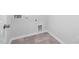 Laundry room featuring tile flooring and a pet door at 413 Providence Springs Ln, Fuquay Varina, NC 27526