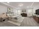 Spacious main bedroom featuring a tray ceiling, soft carpet, and neutral décor at 413 Providence Springs Ln, Fuquay Varina, NC 27526