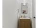 Bathroom featuring modern vanity and stylish mirror at 42 Turkey Ct, Timberlake, NC 27583