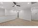 This bedroom features a ceiling fan and spacious layout with wood-look floors at 42 Turkey Ct, Timberlake, NC 27583