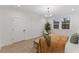 Light and airy bedroom featuring wainscoting, two windows, neutral decor, and wood-look flooring at 42 Turkey Ct, Timberlake, NC 27583
