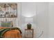 Closeup of a bed with decorative pillows, a bedside table and a lamp with nature artwork at 42 Turkey Ct, Timberlake, NC 27583