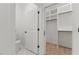 A well-organized closet is conveniently located near a bathroom, featuring custom shelving for optimal storage and accessibility at 42 Turkey Ct, Timberlake, NC 27583