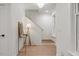 Light and airy entryway with white walls, wood floors and staircase leading up to the next level at 42 Turkey Ct, Timberlake, NC 27583