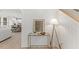 Bright entryway with an accent table and stairs leading to the upper level at 42 Turkey Ct, Timberlake, NC 27583