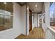 A wooden front porch is a homey place with a welcome mat, and natural wood door at 42 Turkey Ct, Timberlake, NC 27583