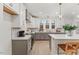 Modern kitchen boasts stainless steel appliances, white cabinets, and granite countertops at 42 Turkey Ct, Timberlake, NC 27583