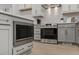Close up kitchen featuring stainless steel appliances, white cabinets, and wood floors at 42 Turkey Ct, Timberlake, NC 27583
