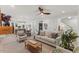 Open concept living room showcases a dining area, kitchen, and comfortable seating arrangement at 42 Turkey Ct, Timberlake, NC 27583