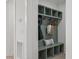 Mud room with custom storage bench and hooks for coats and bags at 42 Turkey Ct, Timberlake, NC 27583