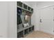 Mud room with custom bench and hooks by the entry way at 42 Turkey Ct, Timberlake, NC 27583