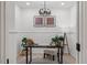 Office space with a modern chandelier and a desk with stylish decor at 42 Turkey Ct, Timberlake, NC 27583