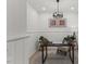 Office featuring hardwood floors, wainscoting, and a modern chandelier at 42 Turkey Ct, Timberlake, NC 27583