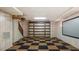 The finished basement has built-in shelving, doors, and a projector screen at 450 S Stratford Dr, Henderson, NC 27537