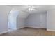 Bedroom features neutral walls, carpet, and good natural light from a window at 450 S Stratford Dr, Henderson, NC 27537