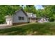 Charming home with a well-manicured lawn and attached two-car garage at 450 S Stratford Dr, Henderson, NC 27537