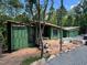 An elegant, modern-style home under construction surrounded by mature trees and set on a beautiful lot at 481 Brook Green Ln # 23, Pittsboro, NC 27312