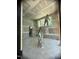 Interior room under construction with large windows and high ceilings at 481 Brook Green Ln # 23, Pittsboro, NC 27312