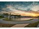 Scenic community with a pond surrounded by walking trails and residential homes at 5009 Megara, Raleigh, NC 27603