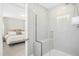 Modern bathroom featuring an all-glass walk-in shower with bench seat at 5009 Megara, Raleigh, NC 27603