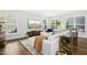 Bright and airy living room featuring modern decor, a large sectional sofa, and plenty of natural light at 5009 Megara, Raleigh, NC 27603