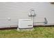 Exterior home view of Generac generator ensures uninterrupted power supply at 52 Brunello Ct, Clayton, NC 27527