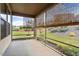 Cozy screened-in porch with tranquil views of the backyard at 52 Brunello Ct, Clayton, NC 27527