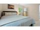 Bedroom with a queen bed, picture window and neutral walls and carpeting at 526 Colony Woods Dr, Chapel Hill, NC 27517