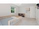 Bedroom with neutral walls and carpet, featuring a play area at 526 Colony Woods Dr, Chapel Hill, NC 27517
