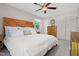 Bedroom featuring a king-sized bed, hardwood floors, and natural light at 526 Colony Woods Dr, Chapel Hill, NC 27517
